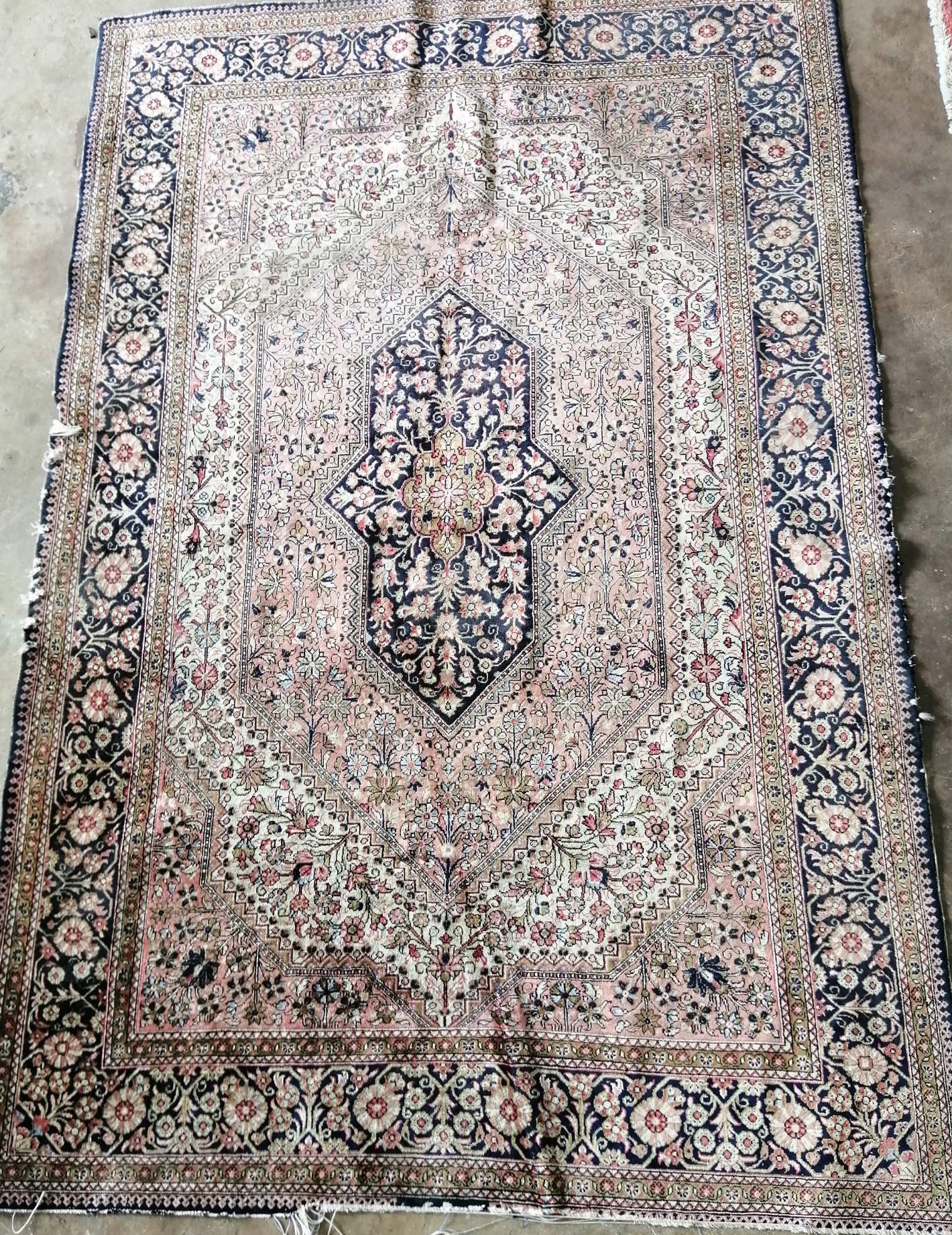 A Persian silk rug, 150 x 94cm